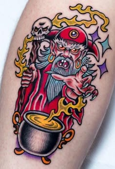 an old school style tattoo with a wizard holding a cauld