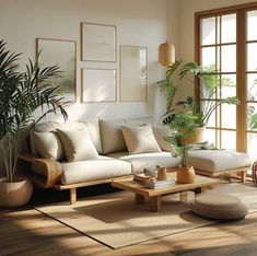 a living room filled with lots of furniture and plants on top of wooden flooring