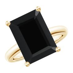 The bold and dramatic rectangular black onyx, held in a prong setting, exudes its magnetic charm and distinctive beauty. Crafted in 14k yellow gold, this black onyx solitaire ring is sure to leave you spellbound. Black Onyx Marquise Engagement Ring, Rectangle Black Diamond Ring, Black Agate Wedding Ring, Black Stone Yellow Gold Ring, Black Diamond Cocktail Rings, Oynx Rings, Classic Black Rectangular Ring, Classic Black Rectangular Jewelry, Onyx Rings