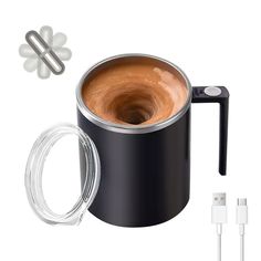 a black coffee mug with the lid open and an extension cord plugged into it