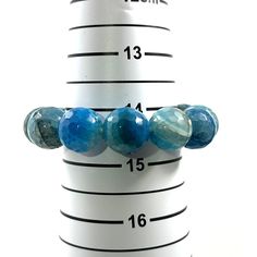 16mm Gemstone Bracelet, Stretchy Elastic Quarts Crystal  Bracelet This endless good luck bracelet made of faceted blue lace agate 16mm beads. This elastic endless bracelet easy to wear, good for ladies and men. Simple everyday wear, gift, prosperity - good fortune. *Other lengths and size also available upon request. Please do not be hesitating to contact us, so that we can quote the price for your reference accordingly. 1.Main Stone: Agate 2.Color: Blue 3.Each Bead Size: approximately 16mm in diameter. 4.Bracelet Size: approximately inner diameter 46mm (1.8 inches) 5.Inner Circumference: approximately 145mm (5.7 inches) 6.Item Number: 750446 Return Policy: *Return within 30 days after receiving your order and we will refund you the purchase price *Buyer is responsible for return shipping Quarts Crystal, Bracelet Easy, Good Luck Bracelet, Handcrafted Artisan Jewelry, Agate Bracelet, Stretchy Bracelets, Blue Lace Agate, Crystal Bracelet, Lace Agate