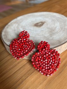 You can't help but fall in love with our Graceful Heart earrings. In these red hearts, you'll be the center of attention at any evening event. Their sparkle and elegance are sure to captivate admiring glances. Available in two colors: beige and red. Ready to ship! Elegant Beaded Earrings With Heart Beads For Parties, Elegant Beaded Earrings For Valentine's Day Party, Beaded Dangle Heart Earrings For Parties, Heart Shaped Beaded Earrings For Party, Valentine's Day Beaded Drop Earrings For Party, Handmade Heart Earrings For Valentine's Day Party, Dangle Beaded Earrings With Heart Beads For Party, Elegant Heart Beads Earrings For Valentine's Day, Elegant Beaded Heart Earrings For Party