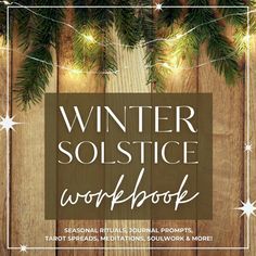 the winter solstice workbook with pine branches and snowflakes on it