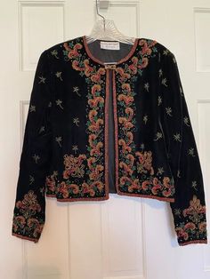 This 1980s Papell Boutique Evening Embellished Jacket is in perfect condition.  It has been in a smoke-free home for years without being worn.  I couldn't find a size but this woman wore small and medium and I tried it on and it fits me perfectly and I wear a small. All beads and sequins are in perfect condition Its sure to turn heads worn with a pair of satin leggings. Vintage Outerwear For Evening In Fall, Vintage Embroidered Formal Outerwear, Vintage Embroidered Blazer For Formal Occasions, Fitted Embroidered Vintage Outerwear, Vintage Embroidered Outerwear For Formal Events, Vintage Embroidered Blazer For Fall, Vintage Black Embellished Outerwear, Satin Leggings, Papell Boutique