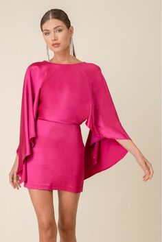 Rise up and stand out in our Henley Hot Pink Pop-Over Mini Dress! This vibrant dress features a Henley neckline and a flowy pop-over layer, adding a touch of boldness to your wardrobe. Perfect for the daring fashionista looking to make a statement. Mini dress Pop Over Top Silky material Flowing cape sleeves Back slit Back zipper closure Pink Cape, Vibrant Dress, Mini Dress Hot, Hot Pink Dress, Brown Wedding, Hot Pink Dresses, Wedding Attire Guest, Cape Sleeves, Daytime Dresses