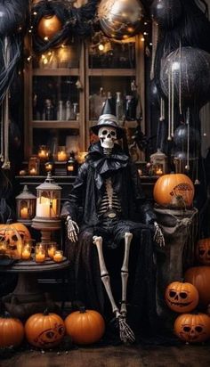 a skeleton sitting on a chair in front of some pumpkins