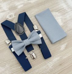 Your special guy will look so handsome when he shows up in his Dusty Blue bow tie, pocket square and Navy Blue suspenders!  Great set for groomsman, best man or ring bearers - This bow tie & suspenders set is a great choice for family photos, wedding, ring bearer outfit, birthday celebration or any other special occasion.  When making a purchase, you can choose from the following options : -Suspenders Only -Bow Tie Only. -Suspenders + Bow Tie Set. - Pocket Square only. -3 Pieces Set : bow tie + Blue Bow Tie For Wedding And Father's Day, Navy Blue Braces, Dusty Blue Bow Tie, Blue Braces, Navy Blue Suspenders, Blue Suspenders, Outfit Boho, Outfit Birthday, Bearer Outfit