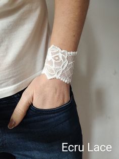 "Versatile stretch lace wrist cuff bracelet in ecru - visit my shop for more designs  Handbands, wrist cuffs, wrist wraps - visit my shop for more color matching accessories *Handmade with love and care in a smoke free home *Every wrist cuff is sewn by me *Ideal for covering wrist tattoos *Stretchy and soft lace *Fabulous accessory for your outfit *Goes well with everything *Unique and standing out COLOR: ecru  MATERIALS: stretchy lace SIZE: CHOOSE YOUR SIZE from the drop down menu If you choose Adjustable White Cuff Bracelet, Adjustable White Wristlet With Wrist Strap, Wrist Tattoo Cover Up, Ceremony Outfit, Wrist Wraps, Tattoo Cover Up, Lace Bracelet, Tattoo Cover, Tattoo Cover-up