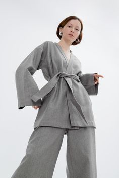 This stunning kimono is perfect for creating a chic and sophisticated look. The comfortable jacket is crafted from natural linen, ensuring breathability and durability. Our cardigan is designed to flatter every body shape and size, making you feel confident and stylish. Elevate your wardrobe with this timeless and luxurious linen kimono that combines comfort with unmatched elegance. KIMONO: Loose fit Dropped shoulders Long sleeves Belt included Sizes: XS, S, M, L, XL, XXL Custom sizes are availa Modern Linen Blazer For Spring, Modern Linen Outerwear For Summer, Modern Linen Summer Outerwear, Elegant Long Sleeve Relaxed Fit Kimono, Elegant Linen Outerwear For Daywear, Elegant Spring Cotton Kimono, Elegant Oversized Linen Outerwear, Elegant Spring Outerwear With Kimono Sleeves, Elegant Relaxed Fit Linen Outerwear