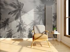 a chair in front of a wall with palm trees on it