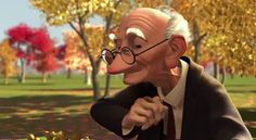 an animated man sitting at a table in the park