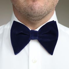 Discover the epitome of elegance and sophistication with our premium Navy Blue Velvet Bowtie and Pocket Square Set. Crafted from the finest velvet fabric, this luxurious set is perfect for the modern gentleman who values quality and timeless style. The rich, smooth texture of the velvet adds a touch of opulence to any formal attire, making it an ideal choice for weddings, black-tie events, and special occasions. Our velvet bowtie is meticulously designed for a perfect fit, while the matching poc Navy Blue Velvet, Wedding Order, Modern Gentleman, Black Tie Event, Business Events, Large Weddings, Tie Accessories, Formal Attire, Tie And Pocket Square