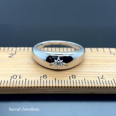 🌙 Elevate your style with our stunning Silver Triple Plated CZ Set Star Dome Ring.  ✨ This dazzling piece features a brilliant 6.2mm dome adorned with sparkling Cubic Zirconia, designed to catch the light and turn heads.  The ring is available in two beautiful options: silver and gold on silver. Whether you prefer a classic silver look or a touch of gold, this ring has you covered. Product Details: Material: High-quality silver Dome Diameter: 6.2mm Stone Type: Cubic Zirconia Plating Options: Si Silver Signet Ring With Single Diamond For Promise, Silver Dome Ring With Diamond Accents For Gift, Silver Star-shaped Ring With Diamond Accents, Fine Jewelry Silver Signet Ring With Diamond, Silver Fine Jewelry Signet Ring With Diamond, Classic Star-shaped Diamond Anniversary Ring, Silver Star-shaped Formal Rings, Classic Silver Star Shaped Rings, Silver Star-shaped Ring For Formal Occasions