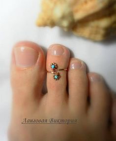 Ring on the toe. Made of silver 925 wire with brass fittings and natural turquoise. Size is adjustable. In the package You will receive one ring for the toe, which select from the options. Bright rings on the toe - very original jewelry for summer, beach season, perfect for every day, Dainty Adjustable Toe Ring Jewelry, Adjustable Dainty Toe Ring Jewelry, Delicate Toe Ring Jewelry, Delicate Tiny Toe Ring Jewelry, Minimalist Toe Ring Jewelry For Beach, Dainty Nickel-free Toe Rings, Delicate Handmade Toe Rings, Handmade Delicate Toe Rings, Dainty Toe Ring For Beach