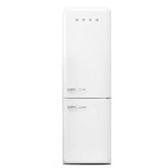 a white refrigerator freezer sitting on top of a white floor next to a wall