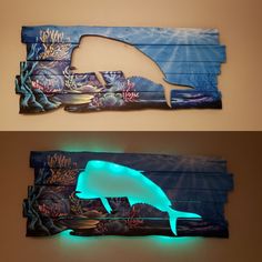 two pictures of the same wall hanging with different colors and shapes, one has a fish on it