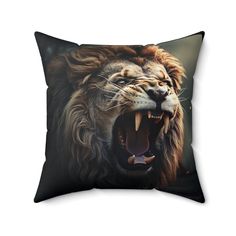 a pillow with an image of a lion's face on the front and side