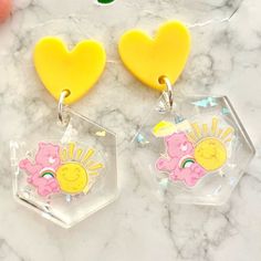 Care Bear Acrylic Earrings For Sale! These Earrings Are So Adorable! They Are Handmade By Me, And Are Incredibly Light In Weight. They Are Made For Pierced Ears, And Are A Little Over 1 Inch Tall And Are Almost 1 Inch Wide. Such Great Earrings To Add To Your Jewelry Collection! Trendy Yellow Earrings For Everyday, Trendy Yellow Everyday Earrings, Yellow Hypoallergenic Earrings For Everyday, Playful Yellow Hypoallergenic Earrings, Hypoallergenic Yellow Earrings For Everyday Wear, Playful Hypoallergenic Yellow Earrings, Playful Yellow Drop Earrings Jewelry, Playful Yellow Dangle Earrings, Playful Yellow Drop Earrings