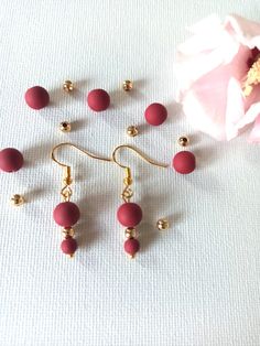 Very pretty handcrafted earrings, matte raspberry red beads and small golden bead. The ear hook is hypoallergenic. Elegant Red Earrings With Gold Beads, Golden Pearl, Raspberry Color, Raspberry Red, Red Beads, Raspberry Pink, Le Crochet, Gold Pearl Earrings, Handcrafted Earrings