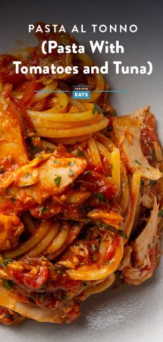 pasta with tomatoes and tuna in tomato sauce on a white plate text reads pasta al tonno pasta with tomatoes and tuna