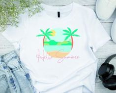 a t - shirt that says hello summer with palm trees and the ocean in the background