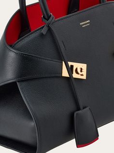 Hug handbag (S) - Women - Salvatore Ferragamo US Ferragamo Handbags, Black Flame, Black Leather Tote Bag, Leather Tote Bag, Hobo Bag, Retro Inspired, Salvatore Ferragamo, David Jones, Leather Tote