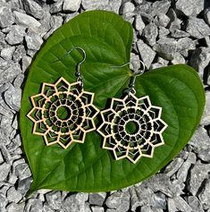 Beautiful, natural wood mandala earrings are perfect for dressings up or every day casual wear.   You will love these light weight cute earrings that will stand out from the rest!  Perfect for gifts! Please message me if you would prefer gold or bronze stainless steel instead.  Thank you for shopping hand made, small business! Wood Mandala, Mandala Earrings, Wooden Earrings, Cute Earrings, Natural Wood, Jewelry Earrings Dangle, Etsy Earrings, Dangle Drop Earrings, Casual Wear