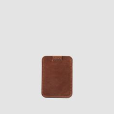 This leather card wallet is designed to hold up to 8 credit cards. ● Holds 4-7 cards in the main pocket and 1 card in the back pocket ● A built-in pull-tab feature for smooth retrieval of your cards It is handcrafted in Europe by experienced craftsmen with precise attention to every detail. DIMENSIONS: Height: 3.74 in / 9.5 cm Width: 2.75 in / 7 cm Depth: 0.15 in / 0.4 cm (without cards) Leather Card Holder With Flat Pocket For Everyday Use, Classic Brown Card Holder With Phone Sleeve, Classic Brown Card Holder With Cell Phone Pocket, Leather Card Holder With Cell Phone Pocket, Brown Leather Card Holder With Cell Phone Pocket, Modern Brown Card Holder For Everyday Carry, Brown Modern Card Holder, Brown Minimalist Card Holder With Rfid Blocking, Work Travel Bag