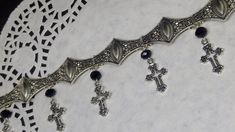 Victorian Gothic metal choker with hollow crosses and black crystal beads, ornate metal necklace, Victorian jewelry, Gothic jewelry A beautifully ornate gothic silver metal choker with Victorian hollow cross charms and black faceted crystal beads. It measures approx. 11 inches in length and has lobster clasp fastening and an extension chain, so that it can be adjusted to fit the neck. The choker is made up of 7 silver toned metal ancient style sections that have intricate detailing. A marvelous Gothic Silver Metal Body Jewelry, Silver Gothic Metal Body Jewelry, Silver Gothic Body Jewelry, Silver Jeweled Metal Choker, Gothic Metal Necklaces With Jewels, Gothic Nickel-free Choker Jewelry, Gothic Nickel-free Choker, Nickel-free Gothic Choker Jewelry, Silver Metal Jewelry With Black Beads