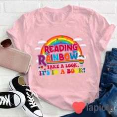 ✔️ TITTLE : Reading Rainbow Take A Look Teacher T-Shirt, Reading Shirt, Book Shirt, Kindergarten Shirt, Teacher Shirt, Gift For Teacher ✔️ IMPORTANT: Both Men and Women can we our shirts because this is unisex style t-shirts; Wash item inside out in cold water, do not bleach, do not dry clean, do not iron directly on the design. ✔️ MATERIAL DETAILS: 5.3-ounce, 100% cotton (99/1 cotton/poly (Ash) & 90/10 cotton/poly (Sport Grey); Heavyweight classic unisex tee; Taped neck and shoulders; Tearaway Summer Bookish T-shirt With Letter Print, Multicolor Funny Print T-shirt For School, Bookish Cotton T-shirt With Letter Print, Multicolor Cartoon Print T-shirt For School, Bookish Cotton T-shirt With Slogan, Educational Graphic Print Crew Neck T-shirt, Bookish Crew Neck T-shirt With Letter Print, Bookish Short Sleeve T-shirt With Funny Text, Summer Bookish Tops With Letter Print