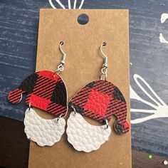 Handmade Santa Earrings Made From Faux Leather. Red Buffalo Plaid And White! These Are Medium Length - Approximately 1.6 Inches Long. All Findings Are Nickel Free. Every Order Comes With A Free Piece Of Handmade Jewelry. Santa Earrings, Michael Kors Earrings, Diamond Pendent, Sapphire Necklace Pendants, Red Buffalo Plaid, Black Onyx Necklace, Gem Diamonds, Gold Bead Necklace, Artisan Earrings