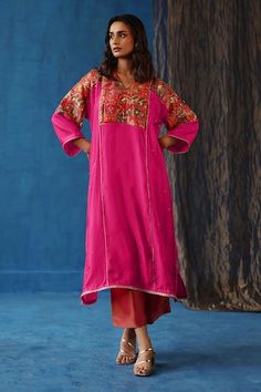 Fuchsia pink phiran with intricate brocade work, hand-embroidered nakshi, dabka, sequin, resham and pitta work. Paired with pant. - Aza Fashions Traditional Pink Kurta With Printed Motifs, Pink Kurta With Printed Motifs For Navratri, Designer Traditional Wear In Pink With Printed Motifs, Festive Pink Traditional Wear With Printed Motifs, Unstitched Pink Sets With Resham Embroidery, Luxury Pink Pant Set With Resham Embroidery, Pink Silk Kurta With Printed Motifs, Transitional Pink Silk Kurta, Transitional Pink Kurta With Printed Motifs