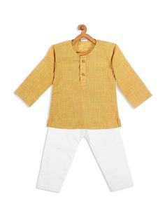 VASTRAMAY SISHU Boys' Yellow Cotton Kurta and White Pyjama Set This delightful set features a vibrant yellow kurta paired with a classic white pyjama, crafted from comfortable and breathable cotton. Perfect for festive occasions and traditional events, this ensemble ensures both style and comfort for your little one. Key Features Bright yellow kurta with white pyjama, breathable cotton fabric, traditional and festive design, comfortable fit for boys, easy to wear and maintain. Specifications Bra Festive White Cotton Pant Set, Festive Yellow Cotton Sets, Traditional Yellow Cotton Pant Set, Festive Yellow Cotton Top, Yellow Cotton Long Sleeve Sets, Yellow Long Sleeve Pant Set For Festive Season, Festive Yellow Long Sleeve Pant Set, Casual Yellow Kurta For Festive Occasions, Casual Yellow Kurta For Eid