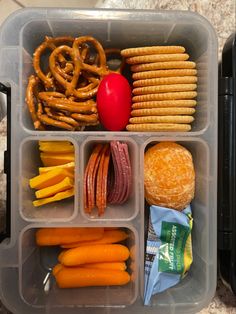 a plastic container filled with lots of food