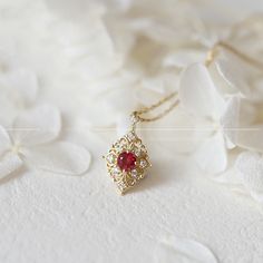 NOT GOLD PLATED, NOT GOLD FILLED. Product Details *Charm made of pure 9K/14K/18K gold *Moissanite stones *Natural Gemstones: Red Ruby *Tarnish resistant and sweat resistant *Hypoallergenic, made without lead, nickel and cadmium Gold Information *9K gold is 9 parts pure gold or 37.5% pure. *10K gold is 10 parts pure gold or 41.7% pure. *14K gold is 14 parts pure gold or 58.5% pure. *18K gold is 18 parts pure gold or 75% pure. *24K gold is all 24 parts are pure gold or 100% pure. Exquisite Red Necklace For Gift, Pendent Designs, Ruby Pendant Necklace, Necklace Ruby, Ruby Necklace Pendant, Dainty Diamond Necklace, Gold Chain Choker, Sparkle Necklace, Ruby Pendant