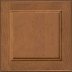 a close up view of the top of a cabinet door with wood grained finish