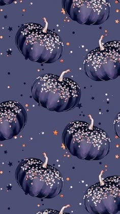 a blue and black pumpkin with stars on it's sides is featured in this image