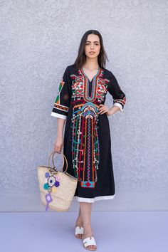 "This beautiful bohemian embroidered tunic dress is surely going to add life and oriental charm to your closet. The dress is made of Egyptian cotton which is widely renowned for its quality and texture. The dress is light and extremely soft and can be used on many occasions - beach, lounge, or even in your home to feel comfortable. Fabric : 70% Egyptian Cotton; 30% Polyester. Tunic measurements in inches : Small (Size 4/6 USA) Bust : 36-37 Hip : 40-41 Medium (Size 8/10 USA) Bust : 39-40 Hip : 45 Bohemian Summer Kaftan With Embroidered Hem, Summer Bohemian Kaftan With Embroidered Hem, Bohemian Kaftan With Embroidered Hem For Summer, Festive Geometric Embroidered Dress, Black Bohemian Tunic For Spring, Festival Tunic Dress With Embroidered Border, Bohemian Black Kaftan For Eid, Black Bohemian Kaftan For Eid, Traditional Black Summer Dress