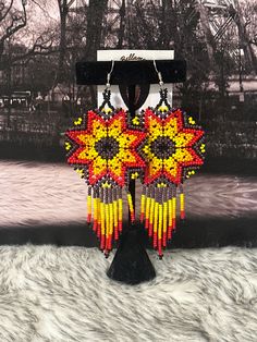 Beautiful large handmade earrings, made with beads by Mexican artisans. Mexican Earrings, Huichol Art, Mexican Jewelry, Hippie Earrings, Artisan Earrings, Colorful Earrings, Beaded Dangle Earrings, Handcrafted Earrings, Handmade Gold