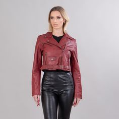 Burgundy short leather jacket.  This short jacket has zipped exterior side pockets, a collar, a belt, and also a zipper closure.  The garment will stand out with its unique pattern and warmth.  The jacket manufactures in our company in Greece with high-quality lambskin. Leather: Lamb Color: Red Length: 45-50 cm (17,7-19,6 in) Collar: Yes Exterior pockets: Yes Belt: Yes Lining: 100% Polyester Care: Specialist clean Belted Long Sleeve Cropped Jacket For Winter, Belted Cropped Jacket With Long Sleeves For Winter, Cropped Leather Biker Jacket For Fall, Belted Leather Biker Jacket For Fall, Leather Belted Biker Jacket For Fall, Leather Cropped Biker Jacket For Fall, Biker Leather Jacket With Belt For Fall, Belted Biker Leather Jacket For Fall, Biker Style Belted Leather Jacket For Fall