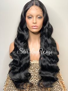 "Gorgeous extra long body wave lace front wig. You will love this loose wavy wig for women. Type of Hair:  Synthetic Hair Texture:   Body Wave Hair Length:   Long Hair Color:   Available in #1, #1b & #2 Cap Style:   Lace Front Wig with adjustable straps & combs - (cap stretches)  Heat Safe:   Heat resistant up to 350 degrees      HEAT SAFE The synthetic and human hair blend wigs in the store are heat safe and can be curled and flat ironed.  Please note that it is recommended that the heat settin Long Hair Color, Black Wig, Beautiful Wigs, Body Wave Hair, Body Wave, Loose Waves, Woman Beach, Synthetic Hair, Lace Front