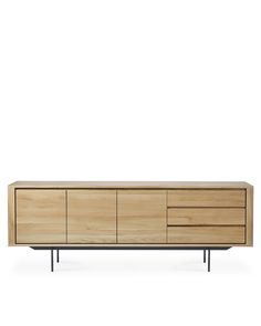 the sideboard is made out of wood and has black metal legs on each side