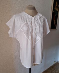 White cotton blouse embroidered, small collar, button up, 100% cotton, made in India, marked size M. Very good vintage condition. flat measurements: armpit to armpit - 59 cm/ 23.2'' waist - 54 cm/ 21.2'' length - 61 cm/24'' Daywear Blouse With Lace Collar, Cotton Blouse With Lace Collar For Daywear, Collared Cotton Blouse With Broderie Anglaise, Collared Blouse With Floral Embroidery For Daywear, Floral Embroidered Collar Blouse For Daywear, Cotton Tops With Lace Collar, Floral Embroidery Collar Blouse For Daywear, Daywear Blouse With Floral Embroidery And Collar, Floral Embroidery Blouse With Collar For Daywear