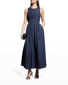 Emporio Armani taffeta dress with a back cutout Scoop neckline; keyhole button back Sleeveless Side seam pockets Ruched skirt Hem falls below the knee Fit-and-flare silhouette Invisible back zipper Polyester Imported