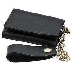 This biker style wallet with chain is a flap-over style with snap closure. Organize your currency inside this 4.75-inch wallet. It features inside pockets plus a clear plastic insert to hold important cards and IDs, The 12-inch silver chain includes a leather loop to strap to your belt. The unisex design makes this leather chain wallet a great gift for bikers and truckers or anyone who appreciates the sleek look of a chain-and-wallet. Chain Wallet Biker Style Leather Trifold Black CWT Plain snaps secure the flap-over closure on this sleek black leather wallet with chain Leather belt loop strap and chain to keep your wallet attached at all times Inside pockets and clear plastic inserts will store your license or other important ID Quality leather for style and durability 4.25 inch wallet wi Cheap Rectangular Wallet On Chain With Card Slots, Black Luxury Wallet On Chain For Formal Occasions, Designer Luxury Wallet On Chain With Card Slots, Luxury Black Wallet On Chain For Formal Occasions, Luxury Wallet On Chain For Evening With Chain Strap, Luxury Office Wallet On Chain With Detachable Strap, Cheap Wallet On Chain With Card Slots, Cheap Rectangular Wallet On Chain For Daily Use, Luxury Classic Wallet On Chain As Gift