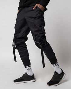 Black mens cargo pants /drop crotch trousers /hip hop pants. If u like urban or streetwear style, you will like this cargo.International Size: S, M, L, XLRussian size: 46, 48, 50, 52Material: 100% CottonBlack colorPockets: 6 pcs.Style: Urban Fit: skinny + cuffs 10 cmSeason: Spring / Summer / AutumnSIZE:We use the international dimensional grid to determine the size. But we prefer to sew clothes for each specific customer by his individual measurements. You provide us with your measurements, and Urban Style Cargo Pants With Multiple Pockets, Urban Cargo Pants With Multiple Pockets For Adventures, Baggy Winter Streetwear Bottoms, Urban Pants With Multiple Pockets For Urban Adventures, Urban Parachute Pants With Belt Loops For Outdoor, Urban Parachute Pants For Outdoor With Belt Loops, Techwear Cargo Bottoms For Urban Adventures, Techwear Bottoms With Cargo Pockets For Urban Adventures, Baggy Urban Parachute Pants For Winter