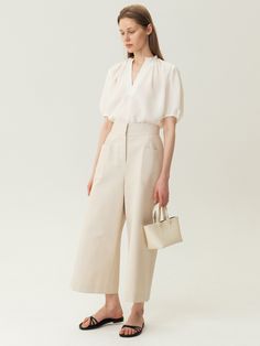 Editor's noteThese culottes embody a sense of resort vibes, offering comfort while maintaining a stylish appeal. Experience the luxurious and relaxed feeling unique to the brand, all while exuding a sense of sophistication.- Straight fit, accentuated with big front pockets- Relaxed silhouette, row-rise fit - Pair them with a blouse Measurements (In.)S/M- Length: 35.83 in. / 36.22 in.- Waist: 14.57 in. / 15.75 in.- Hip: 19.29 in. / 19.69 in.- Rise: 15.35 in. / 15.35 in.- Thigh: 12.6 in. Outfit For Big Thighs, Resort Vibes, Korean Dance, Lit Outfits, Korean Hanbok, Blouse Measurement, Royal Dresses, Business Fashion, Formal Wear