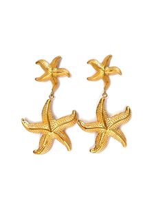 Dive into seaside charm with the "Starfish Earrings" – a delightful pair featuring a larger starfish dangling from a smaller one, both in radiant gold. These earrings capture the whimsy of the ocean, adding a playful touch to your style. Embrace the coastal allure with this charming accessory that evokes the beauty of starfish by the shore. 18k Gold Plated Nickel Free & Hypoallergenic Affordable Chic Earrings For Beach, Ocean-inspired Starfish Charm Earrings, Ocean-inspired Drop Earrings With Starfish Charm, Gold Drop Earrings With Starfish Charm, Ocean-inspired Starfish Charm Dangle Earrings, Beach Star Charm Earrings, Beach Earrings With Star Charm, Gold Starfish Earrings For Beach, Star-shaped Earrings With Star Charm For Beach