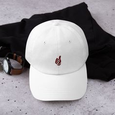 The Texas A&M Gig'Em Hat is a stylish and high-quality baseball cap designed for fans of Texas A&M University. The hat features the iconic "Gig 'Em" hand gesture. The cap is made of durable and comfortable materials, including a cotton twill front panel and a breathable mesh back. It has a pre-curved visor that helps to shield your eyes from the sun and a classic six-panel design that provides a timeless look. The Texas A&M Gig'Em Hat is a great way to show your support for your favorite college Hip Hop Dad Hat For Baseball Season, Trendy Flat Bill Hats For Baseball Season, Hip Hop Hat With Curved Visor For Baseball Season, Hip Hop Curved Brim Hat For Baseball Season, Hip Hop Style Curved Brim Hat For Baseball Season, Texas A M University, Hand Gesture, Texas A&m, College Sports