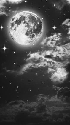 black and white photograph of the moon in the night sky with stars on it's side